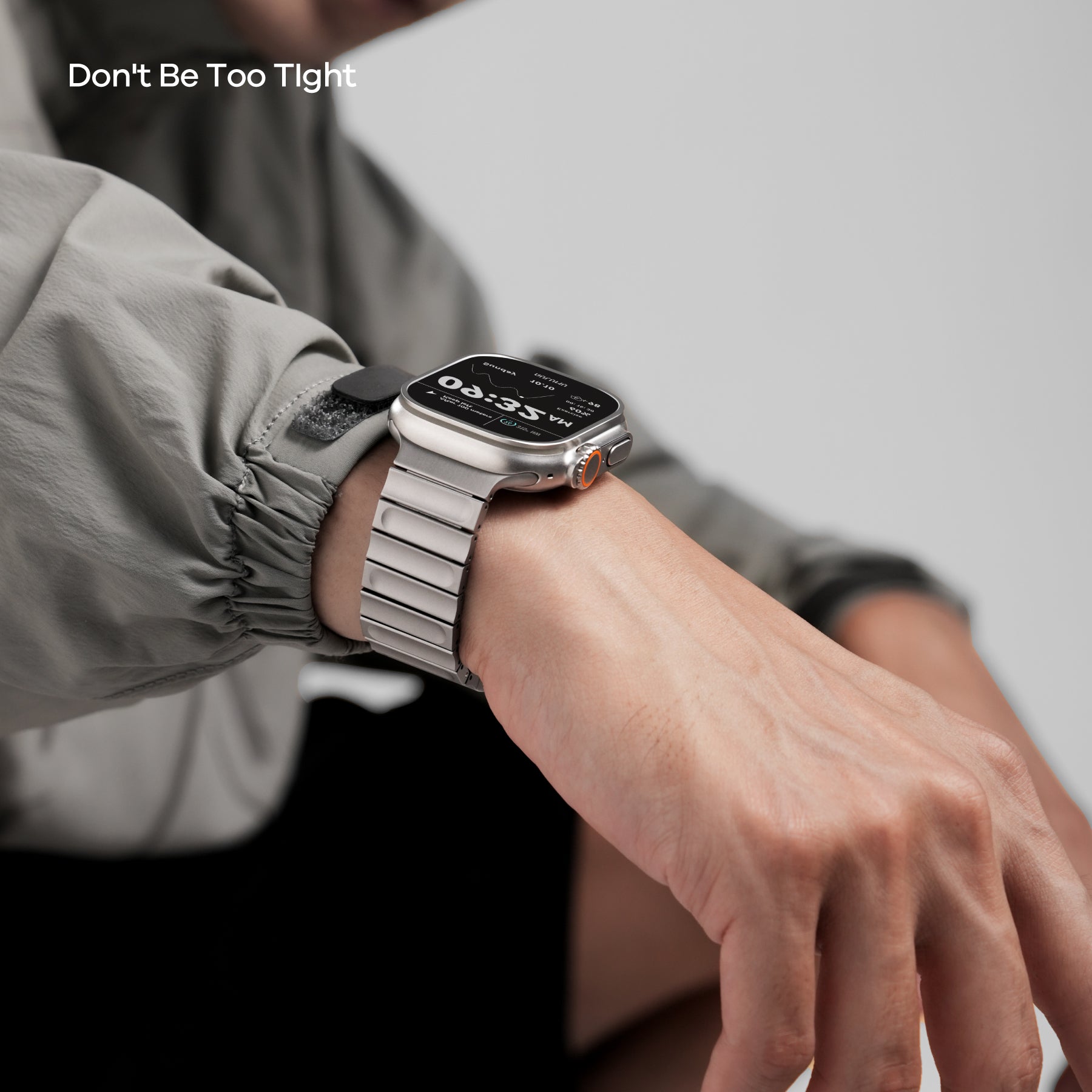 AULUMU C01 titanium watch band worn on wrist, emphasizing comfortable fit that should not be too tight