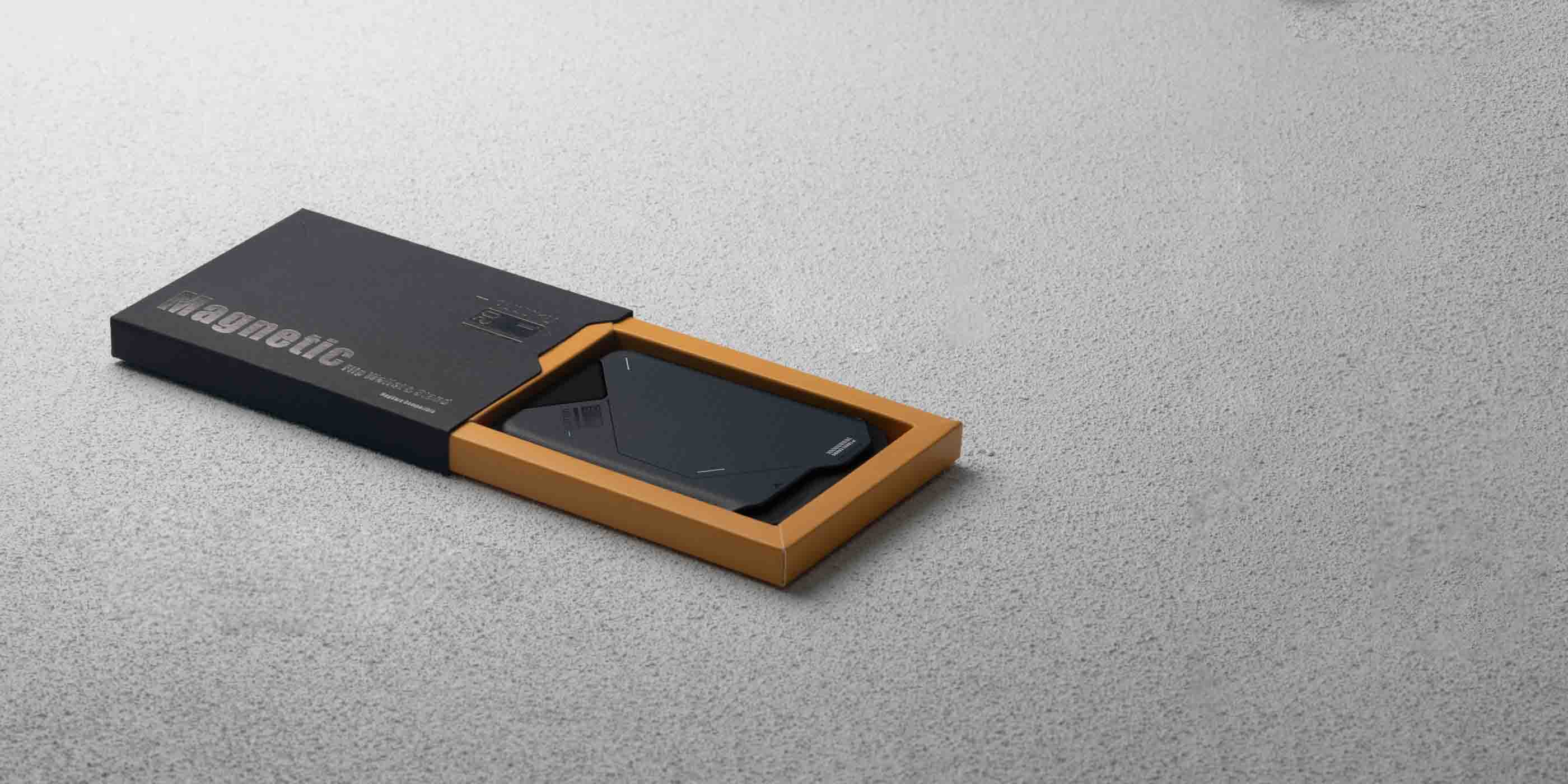Retail packaging of AULUMU G02 Magnetic Flip Wallet opened to show the wallet inside the box.