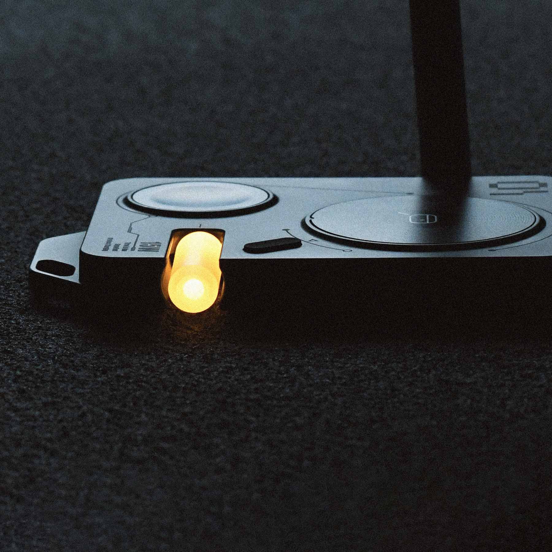 Side view of AULUMU M01 4-in-1 wireless charging station with illuminated night light