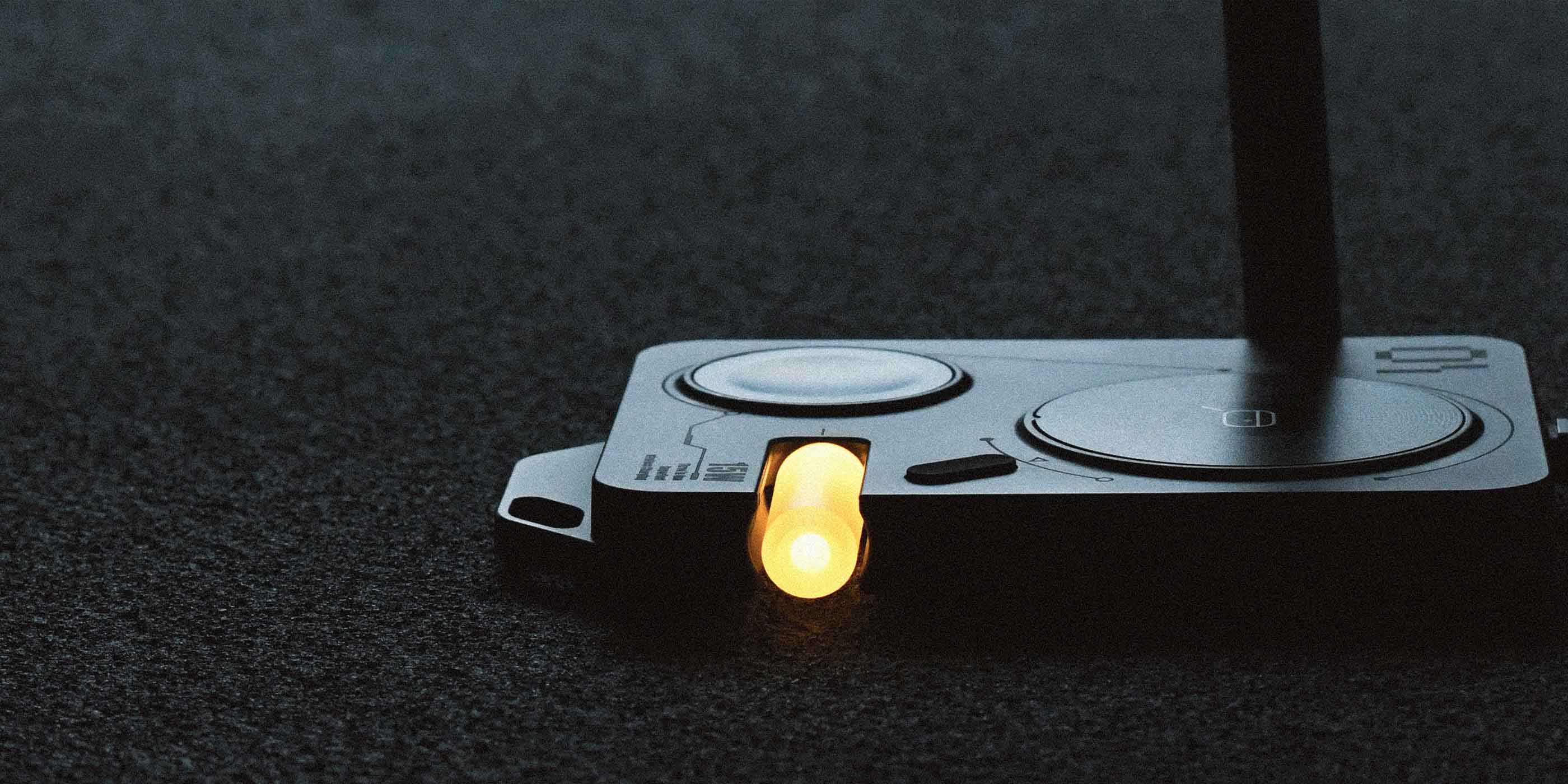 Side view of AULUMU M01 4-in-1 wireless charging station with illuminated night light